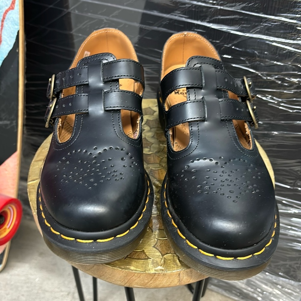 Dr. Martens Black Leather Mary Jane Flats with Yellow Stitching